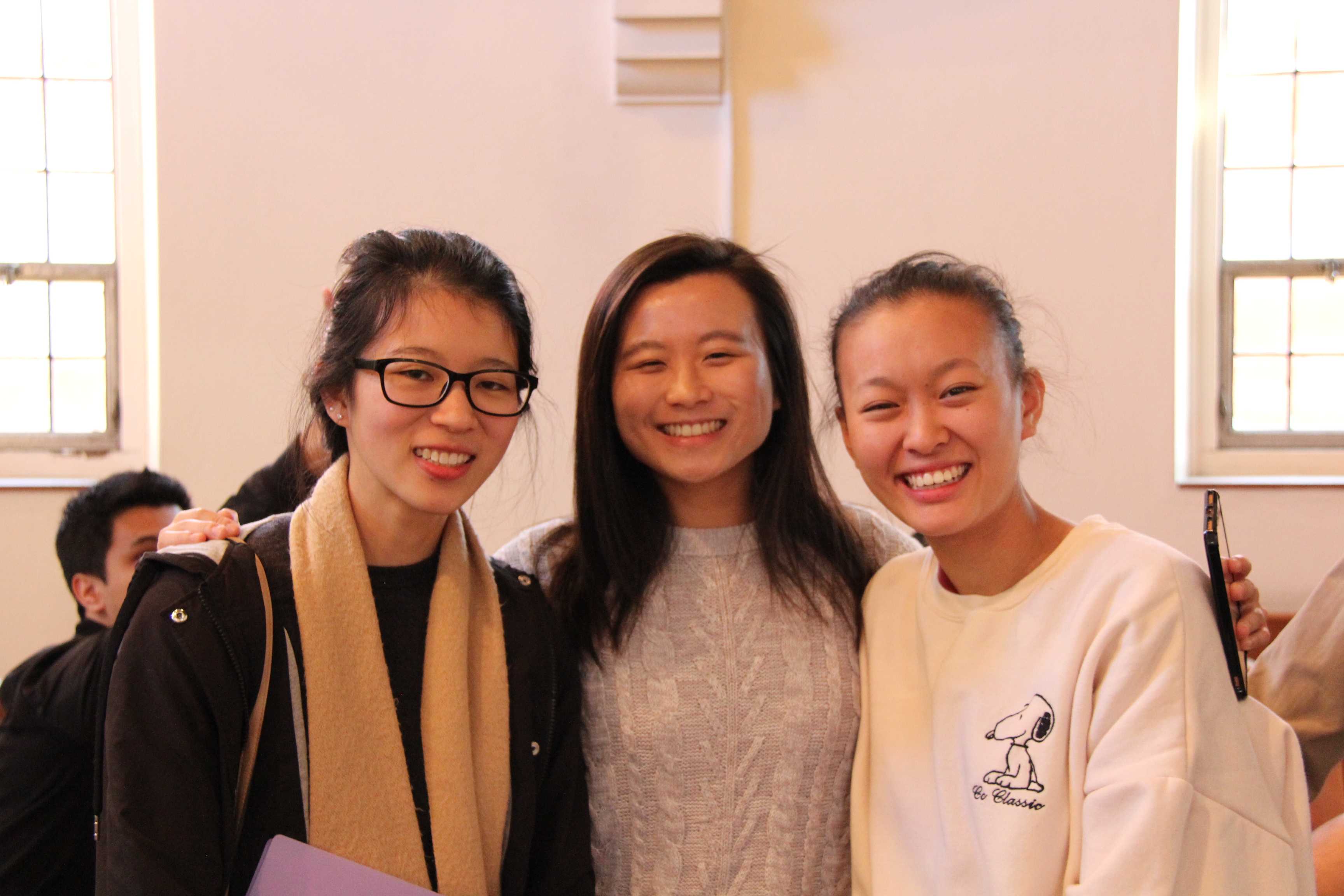 Three women smiling